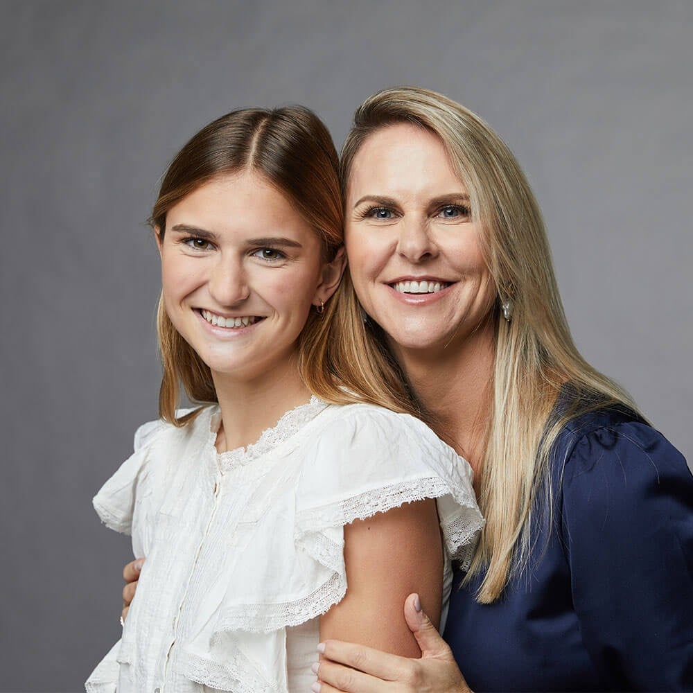 Smiling Mother and Daughter
